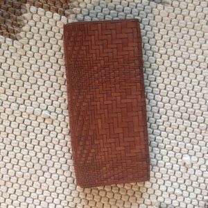 Cole Haan clutch/burnished cognac leather. NWOT